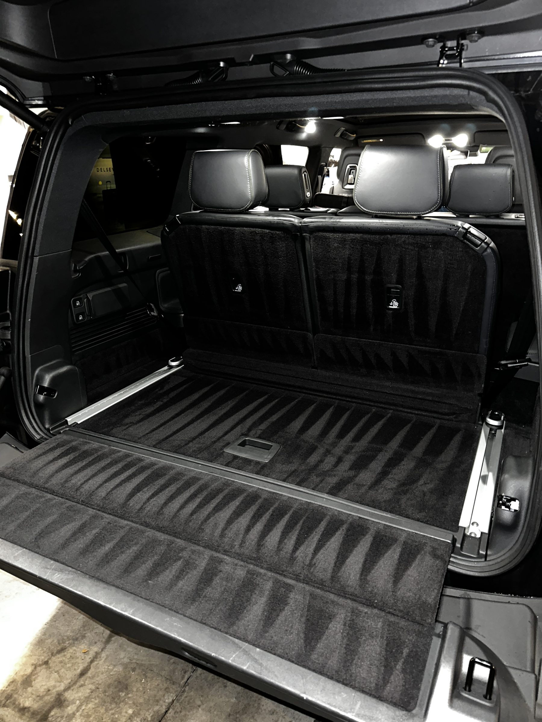 SUV cargo area with vacuum-fresh carpet — Top Auto Detailing monthly maintenance